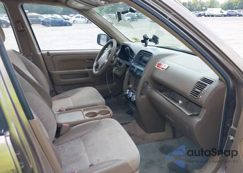 2004 Honda Cr-V Lx z USA, uszkodzony, nr VIN JHLRD68454C013307